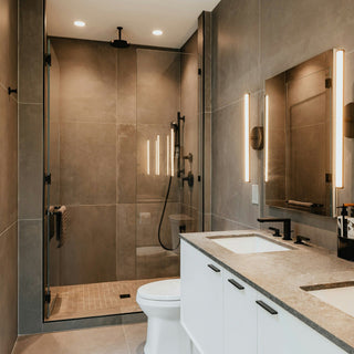 Tiled bathroom with a walk-in shower
