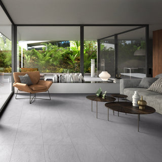 Open-plan living space with large format floor tiles