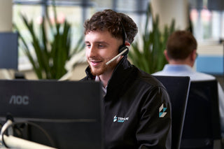 Trimline customer service advisor on a headset